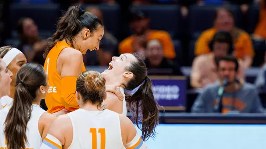 Team Celebrates After Big Point at Home