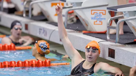 Ella Jansen Celebrates following win in Home Meet