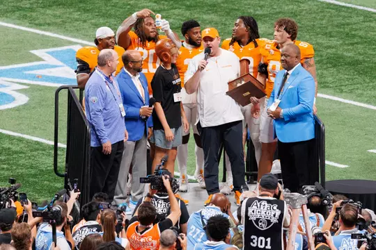 KNOXVILLE, TN - August 30, 2025 - Head Coach Josh Heupel, Linebacker Arion Carter #7, Defensive lineman Bryson Eason #20, Defensive lineman Dominic Bailey #90, and Tight end Miles Kitselman #87 of the Tennessee Volunteers after the Aflac Kickoff game between the Syracuse Orange and the Tennessee Volunteers at Mercedes Benz Stadium in Atlanta, GA. Photo By Avery Bane/Tennessee Athletics