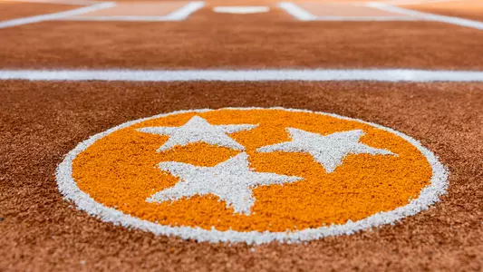 KNOXVILLE, TN - April 17, 2025 - Orange and White Tri-Star logo behind home plate before the game between the Auburn Tigers and the Tennessee Lady Volunteers at Sherri Parker Lee Stadium in Knoxville, TN. Photo By Andrew Ferguson/Tennessee Athletics
