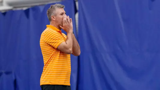 KNOXVILLE, TN - MARCH 30, 2025 - Assistant Coach Matias Marin of the Tennessee Volunteers during the game between the Texas A&M Aggies and the Tennessee Lady Volunteers at Goodfriend Tennis Center in Knoxville, TN. Photo By Peyton Collimore/Tennessee Athletics