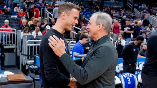 ORLANDO, FL - March 18, 2023 - Head Coach Jon Scheyer of the Duke Blue Devils and Head Coach Rick Barnes of the Tennessee Volunteers before the second round game of the 2023 NCAA Men’s Basketball Tournament between the Duke Blue Devils and the Tennessee Volunteers at Amway Center in Orlando, FL. Photo By Andrew Ferguson/Tennessee Athletics