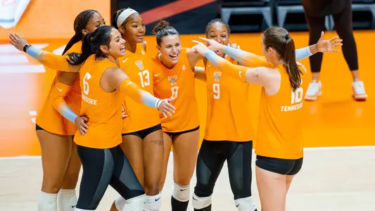 Team Celebrates Point at Orange and White Scrimmage