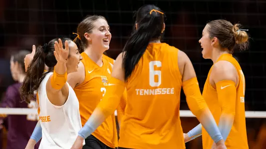 Lady Vols Celebrate Point During Match