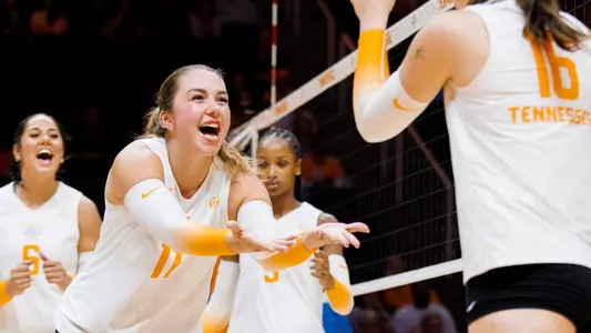 Caroline Kerr and Chelsea Sutton Celebrate Point in Match Against Wofford