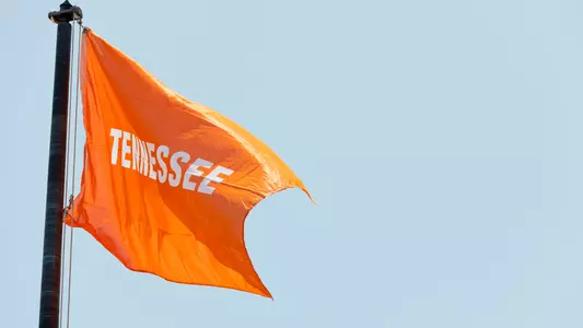 OKLAHOMA CITY, OK - June 01, 2025 - Orange Tennessee flag flys during the 2025 NCAA Women’s College World Series game between the UCLA Bruins and the Tennessee Lady Volunteers at Devon Park in Oklahoma City, OK. Photo By Andrew Ferguson/Tennessee Athletics