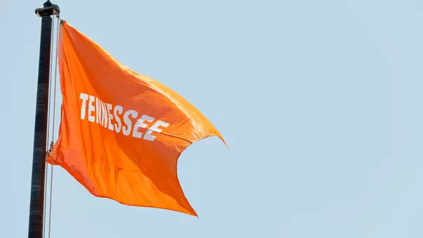 OKLAHOMA CITY, OK - June 01, 2025 - Orange Tennessee flag flys during the 2025 NCAA Women’s College World Series game between the UCLA Bruins and the Tennessee Lady Volunteers at Devon Park in Oklahoma City, OK. Photo By Andrew Ferguson/Tennessee Athletics