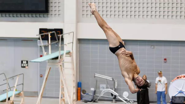 Owen Redfearn Performs Dive in Home Meet