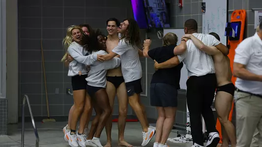 Team Celebrates with Bennett Greene Following 1-Meter Diving Win