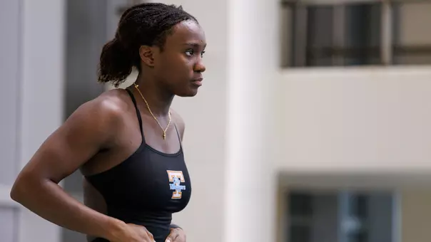 Desharne Bent-Ashmeil Prepares for Dive in Meet at Allan Jones Aquatic Center