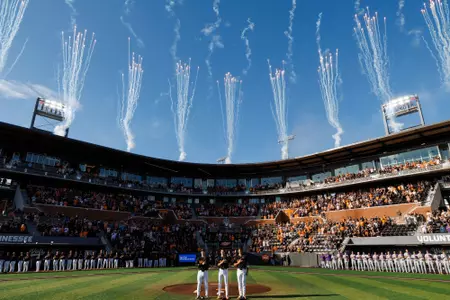 KNOXVILLE, TN - April 04, 2026 - Wide angle with Catcher Levi Clark #16, Pitcher Tegan Kuhns #21 and Infielder/Outfielder Henry Ford #9 of the Tennessee Volunteers during the national anthem before the game between the LSU Tigers and the Tennessee Volunteers at Lindsey Nelson Stadium in Knoxville, TN. Photo By Kate Luffman/Tennessee Athletics