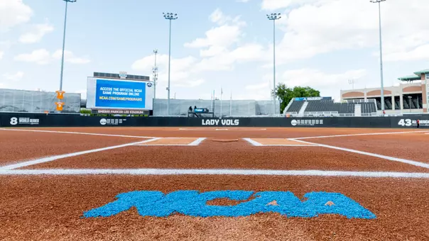 KNOXVILLE, TN - May 23, 2025 - NCAA logo painted on dirt behind home plate before game one of the 2025 NCAA Softball Tournament Super Regional game between the Nebraska Cornhuskers and the Tennessee Lady Volunteers at Sherri Parker Lee Stadium in Knoxville, TN. Photo By Andrew Ferguson/Tennessee Athletics