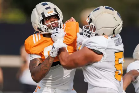 KNOXVILLE, TN - August 12, 2026 - Offensive lineman Antoni Ogumoro #55 and Defensive lineman Nuk Simmons #87 of the Tennessee Volunteers during 2026 Fall Camp practice on Haslam Field in Knoxville, TN. Photo By Peyton Collimore/Tennessee Athletics