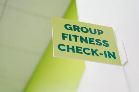 Photo of group fitness check-in sign.