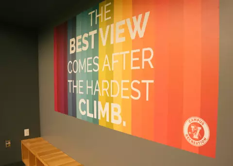 Photo of wall art reading "The best view comes after the hardest climb."