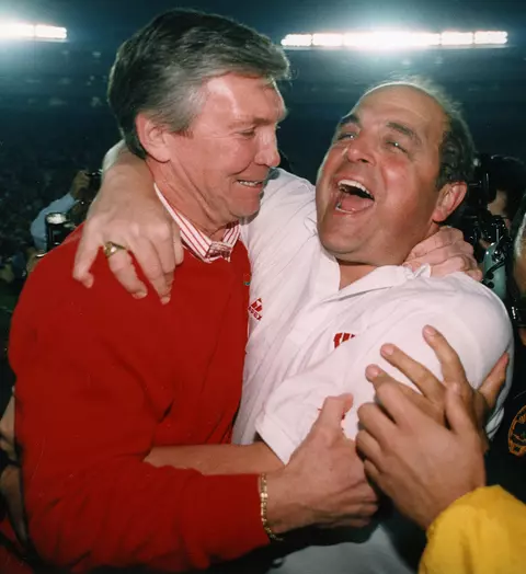 Pat Richter, UW Athletic Director (left), and Head Football Coach Barry Alvarez celebrate Wisconsin's 21-16 win over UCLA in the 1994 Rose Bowl on Jan. 1, 1994.
Used with permission by:                                 UW-Madison University Communications  608/262-0067
Photo by:   Del Brown, courtesy UW Sports Information
Date:  01/94     File#:   photo provided