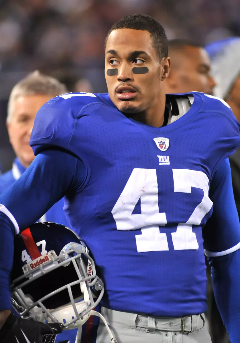 New York Giants Travis Beckum #47 Tight end on the sidelines during the Arizona Cardinals vs New York Giants game Cardinals 24, Giants 17 win over the Giants at Giants Stadium in East Rutherford, NJ on Oct. 25, 2009.