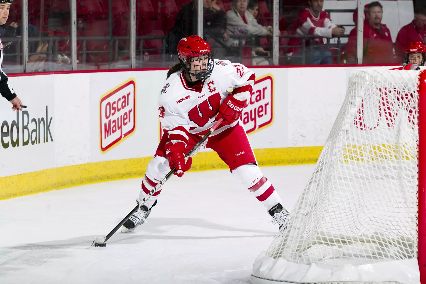 Wisconsin Badgers Hilary Knight (23) handles the puck during an NCAA women's hockey game against the Minnesota Golden Gophers on October 14, 2011 in Madison, Wisconsin. The Badgers won 3-2. (Photo by David Stluka)