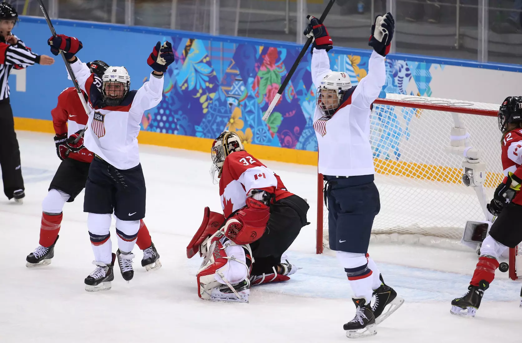 Feb. 12, 2014 - Sochi, RUS - USA's Hilary Knight (right) celebrates her goal with Kelli Stack (16) against Canada goalkeeper Charline Labonte (32) in the second period of a women's hockey game at the Winter Olympics in Sochi, Russia, Wednesday, Feb. 12, 2014