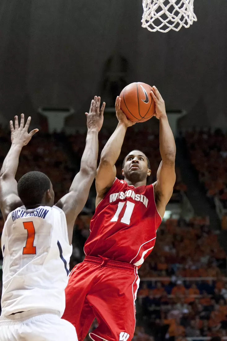 January 22 2012: Wisconsin Badgers guard Jordan Taylor shoots over D.J. Richardson of the Illinois Fighting Illini during an NCAA basketball game at Assembly Hall, Champaign, Illinois.