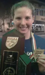 Elise Walch poses with the state championship trophy and medal