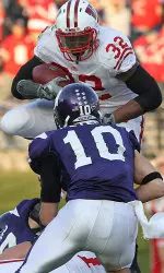 <b>John Clay runs vs. Northwestern. (photo by Joe Koshollek, 11/21/09)</b>