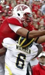 <b>This catch by Nick Toon, in which he caught a touchdown pass despite being interfered with, won Play of the Year at the Football Awards Show. (AP Photo/Morry Gash)</b>