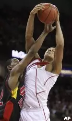 <b>Ryan Evans pulls down one of Wisconsin's 40 rebounds.</B>