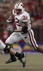 Wisconsin running back John Clay (32) runs during the third quarter of an NCAA college football game against Hawaii, Saturday, Dec. 5, 2009, in Honolulu. (AP Photo/Marco Garcia)