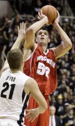 Wisconsin's Keaton Nankivil, right, pulls up for a shot over Purdue's D.J. Byrd in the first half of an NCAA college basketball game in West Lafayette, Ind., Thursday, Jan. 28, 2010. (AP Photo/Michael Conroy)