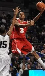<b>Trevon Hughes led the Badgers with a game-high 18 points.</b>