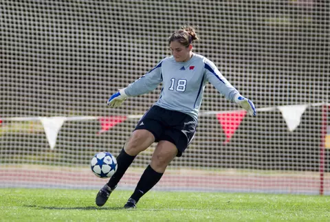 Senior Michele Dalton in play against Illinois.