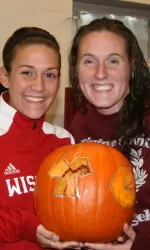 <b> Meghan Flannery and Nicole La Petina with their final project for the pumpkin carving contest </b>