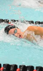 <b>Junior Beckie Thompson helped the Badgers win four of their eight events in a close loss to Minnesota Friday.</b>
