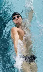 <b> Jesse Stipek had a good day for the Badgers, including a first place finish in the 200-yard backstroke.<b>
