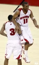 <b>Taylor learned from last year's seniors Trevon Hughes (3) and Jason Bohannon, but is playing the role of big brother these days.</b>