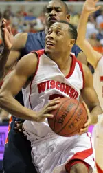 <b>Senior guard Trevon Hughes tied for the team-high with 14 points against Illinois</b>