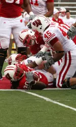 <b>Dan Moore tackles Zach Brown during last year's Spring Game.</b>
