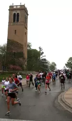 <b>Participants of the 2010 Crazylegs Classic run through the UW campus.</b>