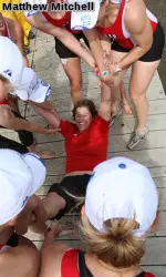 <b>Head Coach Bebe Bryans prepares for her celebratory throw into Lake Ovid</b>