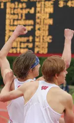 <b>Seniors Jack Bolas and Craig Miller celebrate after finishing 1-2 in the 1,500 meters Sunday</b>