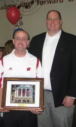 <b>UW Athletics marketing director Kevin Kluender (R) and assistant Adam Ahearn accept a campus partnership award</b>