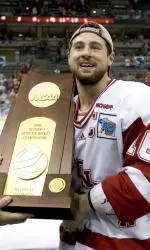 <b>Adam Burish accepts the 2006 NCAA championship trophy after Wisconsin's 2-1 victory over BC</b>