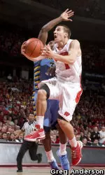 <b>Ben Brust goes in for a layup against Marquette during Saturday's game.</b>