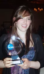 <b>Sophomore Becca Ruegsegger poses with her NCAA Elite 88 Award.</b>