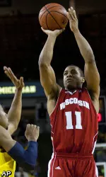 <b>Junior guard Jordan Taylor joins senior teammate Jon Leuer on the NABC All-District 7 first team.</b>