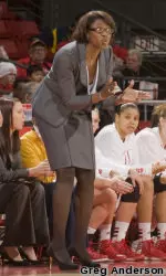 <b>Head coach Bobbie Kelsey cheers on her team from the bench.</b>