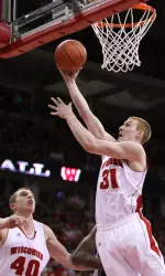 <b>Mike Bruesewitz (31) goes up for a shot</b>