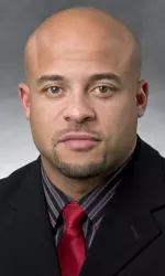 <b>Eddie Faulkner joins the Badgers as the team's new tight ends coach.</b>
