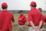 <b>Badger coach Michael Burcin talks with the team</b>